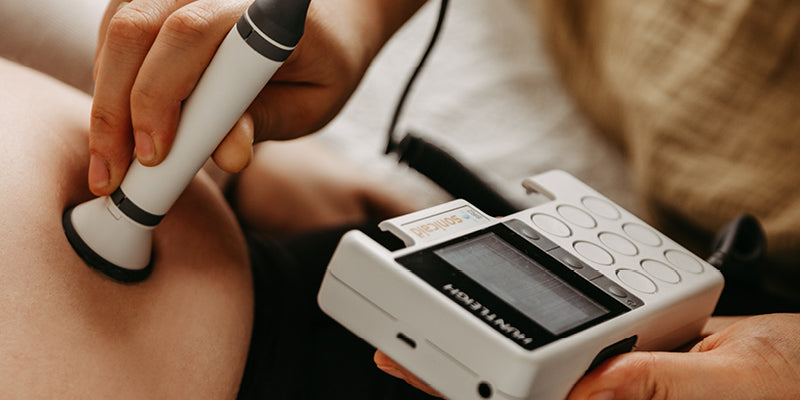 Fetal-Doppler an schwangerem Bauch
